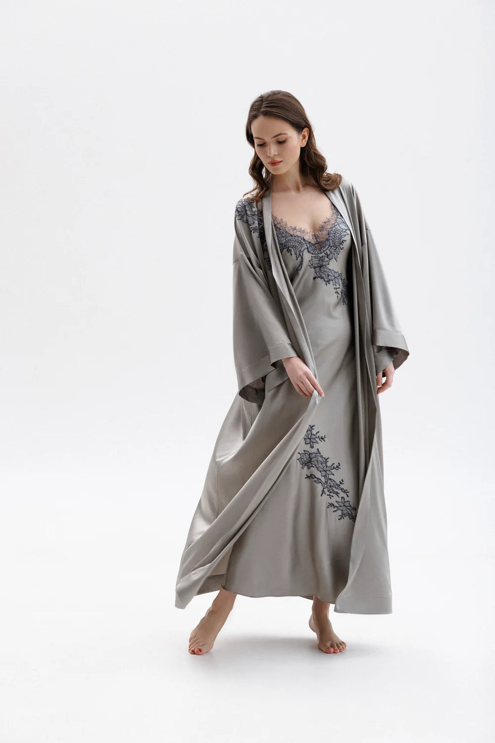 Woman wearing a silver silk sleeping gown with floral embroidery showing the full figure picture with matching peignoir (sold separately)