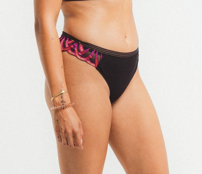 Front of the Virtual Sunset Embordered Tanga by Louisa Bracq.