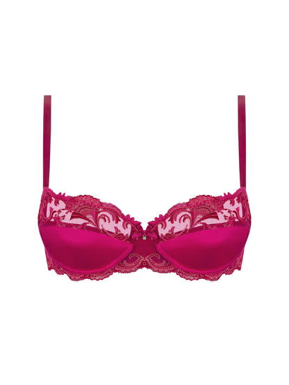 Pink lace bra on a white background