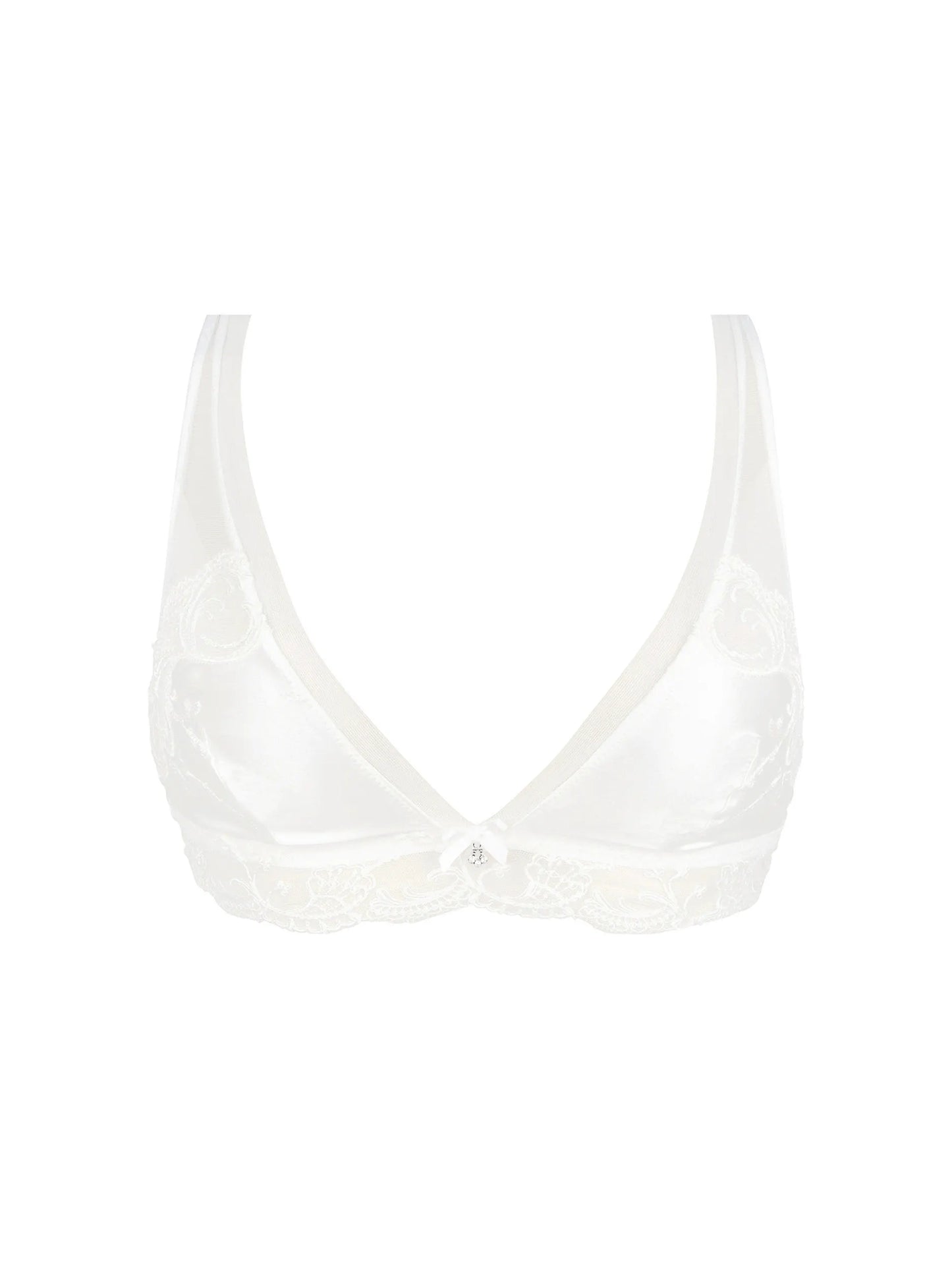 White bikini top on a light beige background