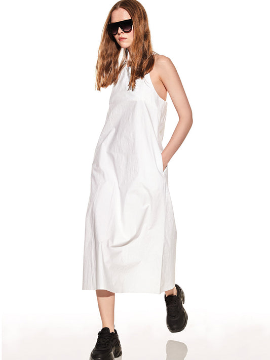 Verdissima's Isla collection from Italy offers an elegant maxi sundress crafted from lightweight, breathable cotton fabric, promising a cool and comfortable feeling all day long.