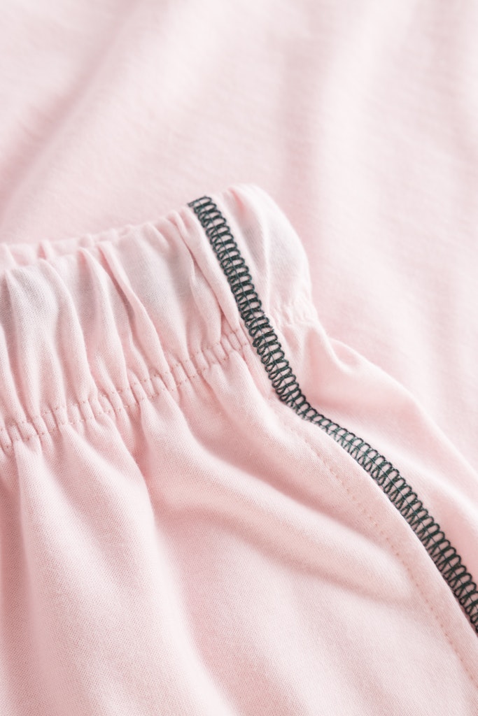 Be Happy Cotton Bermuda Shorts front picture detail on decorative seam on side
